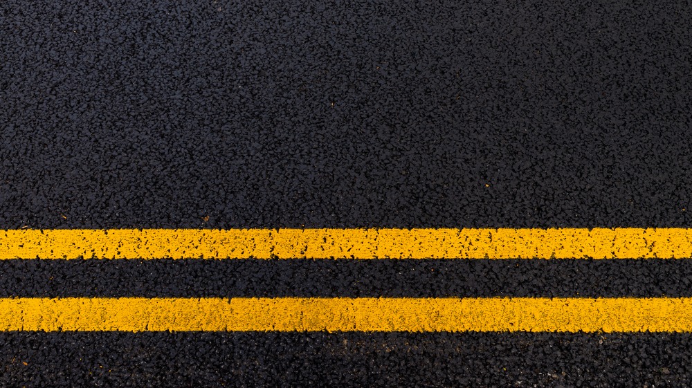 Yellow,No,Parking,Lines,On,Freshly,Laid,Tarmac,Road.