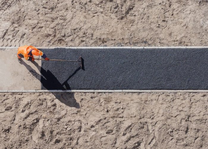 Laying,Worker,New,Asphalt,Paving,Road,Construction,Site,Work,Pathway.