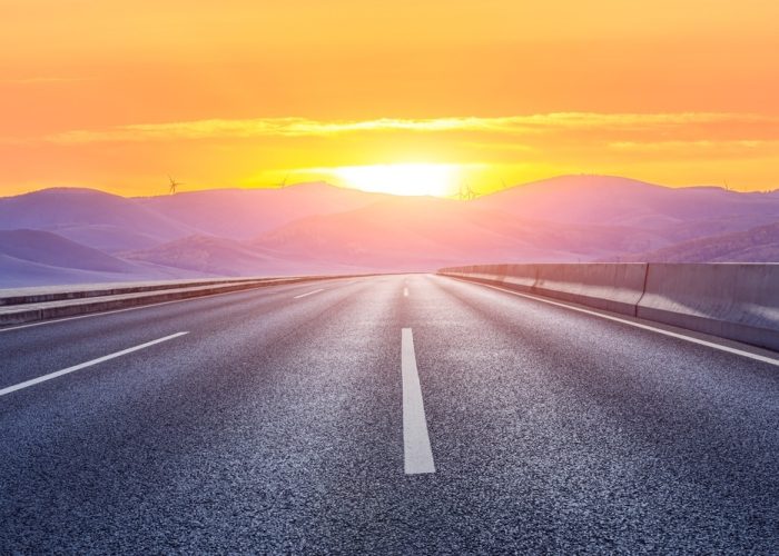 Asphalt,Road,And,Mountain,With,Beautiful,Sky,Clouds,At,Sunrise